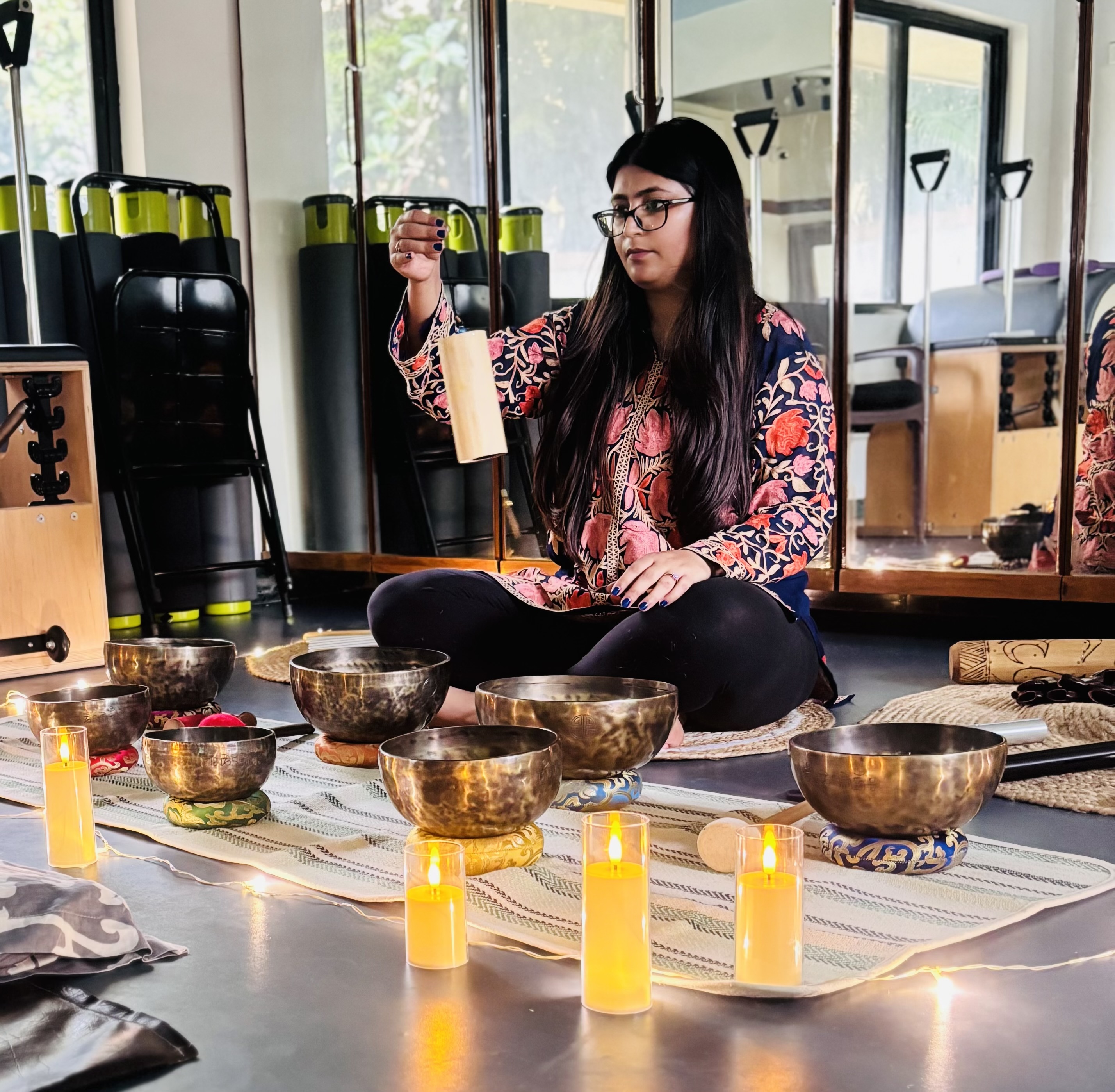 Maneesha conducting a sound bath